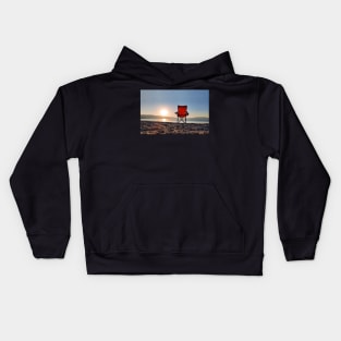 Sunrise behind the chair Kids Hoodie